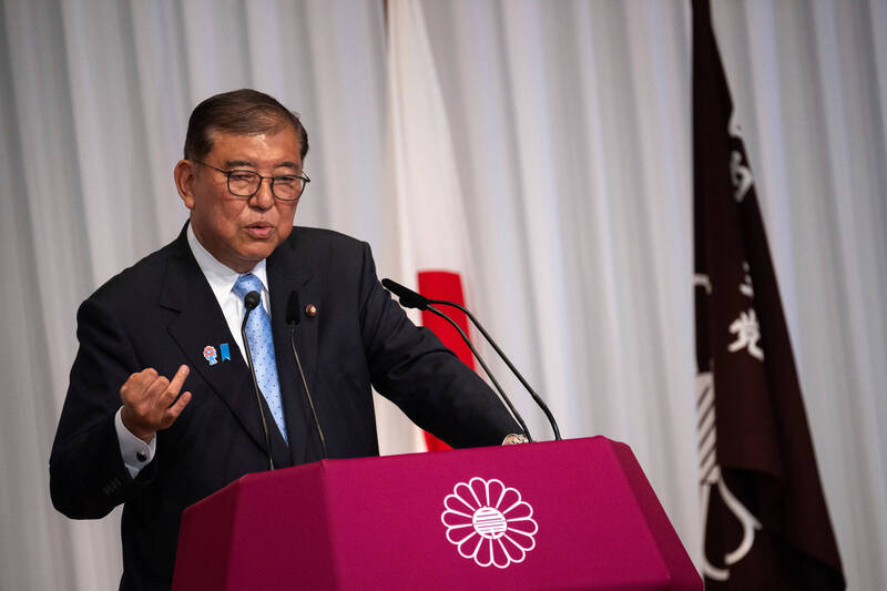 日本首相石破茂今天表明继续留任的明确立场，避免国政陷入停滞。（美联社）