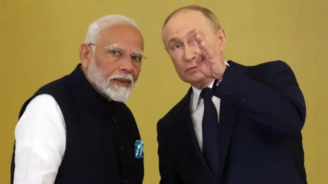 俄罗斯总统普京（右）和印度总理莫迪（左）。