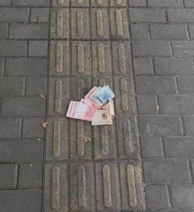 网友5天从上海走到杭州   捡到1000多元现金